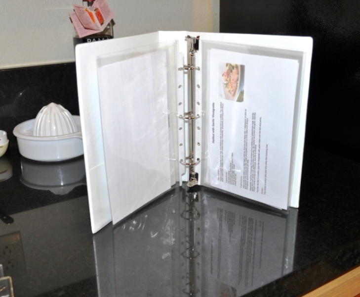 Prop up the recipe index cards while in the binder on the kitchen counter